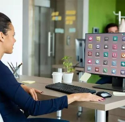 image of a woman sitting in front of a computer